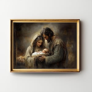 May include: A framed artwork depicts a tender scene of a family. A man and woman gaze at a baby nestled in a manger. The artwork is in a gold frame, with soft lighting and muted colors.