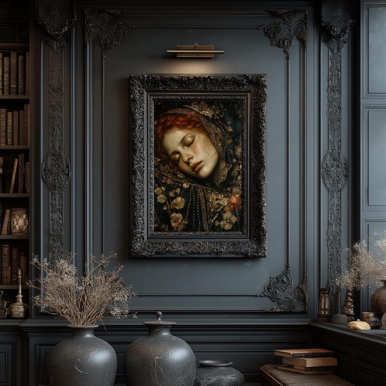 May include: A framed portrait of a woman with red hair and closed eyes, wearing a floral patterned head covering. The portrait is in a black ornate frame, mounted on a dark gray wall. The room features dark decor, including vases and a bookshelf.