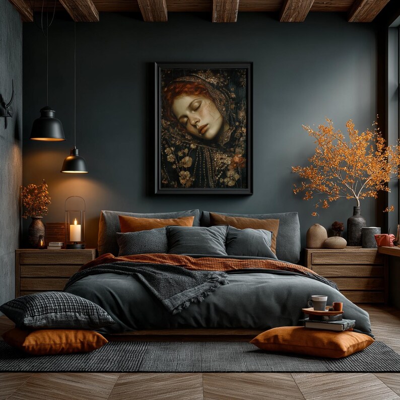 May include: A bedroom with a dark teal wall and wooden beams. A framed portrait hangs above a bed with gray bedding and orange pillows. Two black pendant lights hang from the ceiling. A vase of orange branches sits on a wooden nightstand.