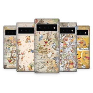 May include: Five phone cases with illustrations of Winnie the Pooh characters. The cases have a beige background with images of Pooh, Piglet, Eeyore, and Tigger. One case features a sign that reads "Welcome Hundred Acre Wood."