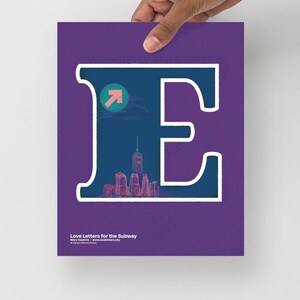 May include: A purple poster with a white outline of the letter E. The letter is filled with a dark blue background and a cityscape with a pink arrow pointing upwards. The text "Love Letters for the Subway" is at the bottom of the poster.