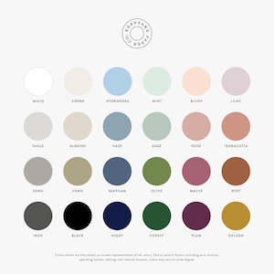 May include: A color palette chart from Keepsake Paper Co. featuring twenty-four circular color swatches arranged in a grid. Each circle is labeled with its corresponding color name, including white, creme, hydrangea, mint, blush, lilac, shale, almond, haze, sage, rose, terracotta, sand, fawn, seafoam, olive, mauve, rust, iron, black, night, forest, plum, and golden.