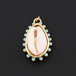 May include: A gold-colored pendant featuring a natural seashell encased in a gold frame with turquoise enamel accents. The pendant has a small loop at the top for hanging. The seashell is a light cream color, and the pendant is set against a black background.