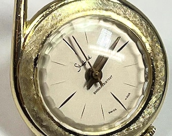 vintage Sheffield Swiss-made 29mm manual-wind pendant watch. Gold Tone with chain. Running.