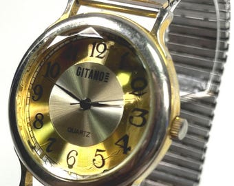 Gitano 36mm Swiss Movement "Faceted Gypsy" Gold-tone vintage Quartz watch. New Battery.