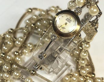 Anne Klein Diamond Swiss watch New Battery & Anne Klein long necklace strands of gold-tone chains, faux pearls and gold-tone beads