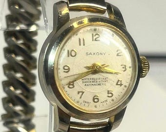 Saxony Ladies Wristwatch Gold Tone Mechanical Manual Wind Swiss Made Antimagnetic Water-Resistant Stretch Expansion Band Vintage Style