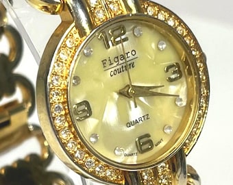 Figaro Couture vintage mother-of-pearl face crystal-encrusted bezel & rhinestone hour markers. New Battery.