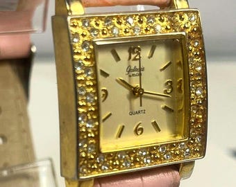 Elgin Galaxie Quartz Watch Gold Tone Square Case Double Row Rhinestone Bezel Pink Leather Strap Gold Dial Numeric Markers Vintage Style