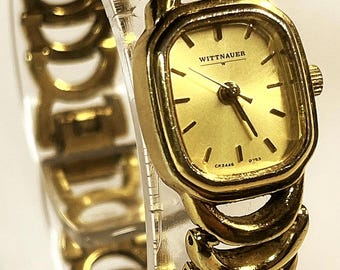 Wittnauer bracelet Quartz watch vintage ladies' gold-tone band made of linked segments. new battery