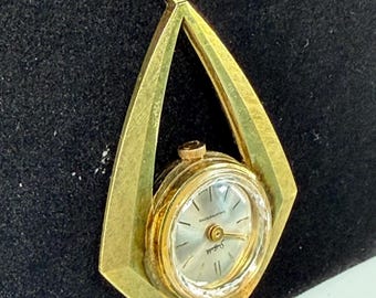 Vintage Sheffield mechanical hand wing gold tone pendant watch, 16" butterflies' chain.