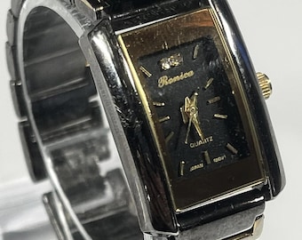 Vintage Ronica Quartz watch two tone metal band Japan movement rectangular black dial gold accents and a new battery