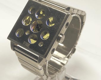 Storm Invada Square 34mm Limited Edition with New battery. Storm's innovative design is a standout piece for collectors, fashion enthusiast.