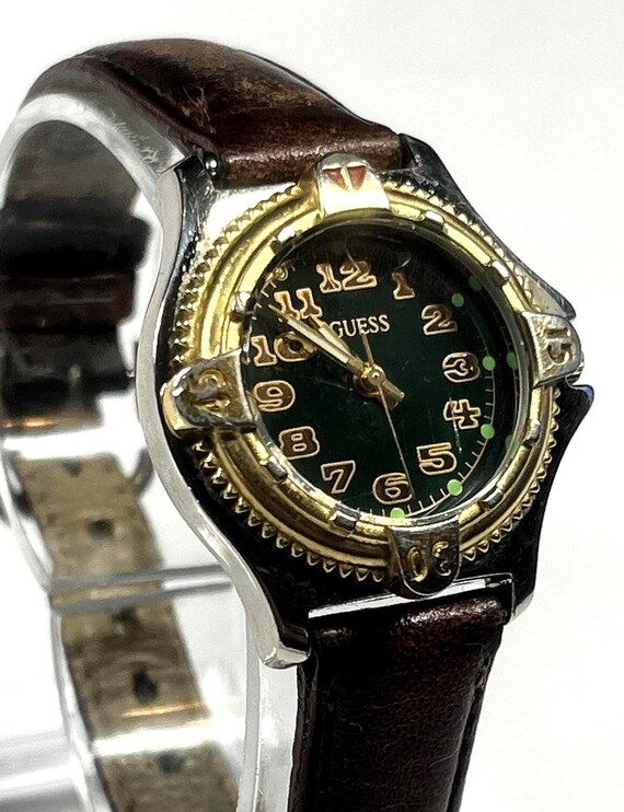 Vintage Guess Watch Features a Green Face Silver and Gold  display picture 1