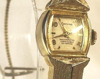 Sperina Vintage Ladies 1 jewel wristwatch gold tone case and band. Swiss mechanical shock protected unbreakable mainspring 60s era, running.