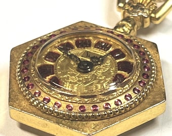 Vintage Sheffield hexagonal pendant watch gold tone red accents ornate detail, Mechanical Swiss Movement, collector's gem timeless charm.