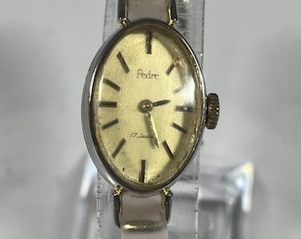 vintage Pedre 17-jewel manual-wind ladies' wristwatch. Gold tone running condition.