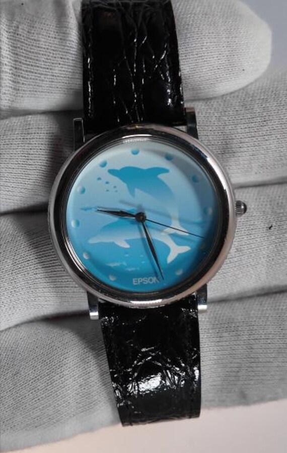 Epson 32mm Extremely rare Vintage quartz wristwatch on a black leather strap unique blue face Epson design knurled bezel edge. New battery View 5