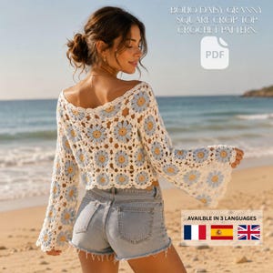 May include: A crochet crop top featuring a pattern of white, light blue, and yellow daisy granny squares with long bell sleeves. The text BOHO DAISY GRANNY SQUARE CROP TOP CROCHET PATTERN and PDF are visible. A small graphic shows French, Spanish, and British flags.