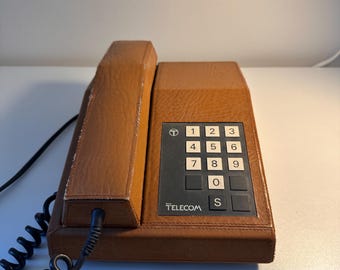 Vintage lederen British Telecom-drukknoptelefoon