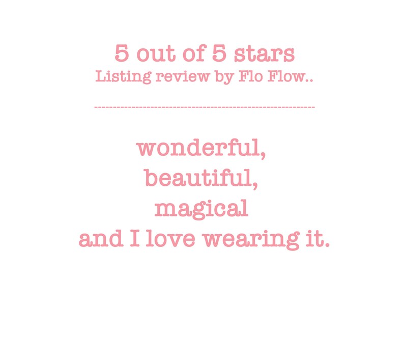 May include: A customer review for a product with a 5 out of 5 star rating. The review says "wonderful, beautiful, magical and I love wearing it."