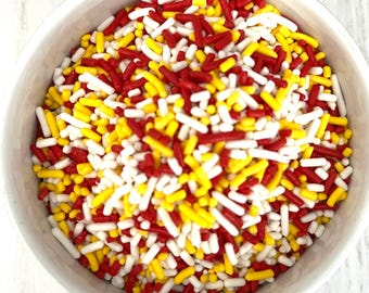 ¡Una mezcla fantástica de chispas rojas, amarillas y blancas! Ideal para todos tus eventos, cumpleaños, repostería, decoración de pasteles y cupcakes. ¡3 onzas!