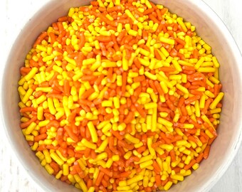 Mezcla de chispas de mandarina y limón. ¡Jimies comestibles neón naranja y amarillo vibrante para decorar pasteles, cupcakes y dulces!