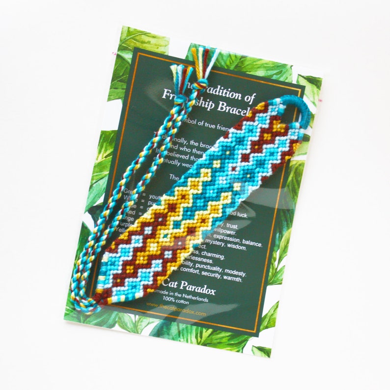 Friendship bracelet macram\u00e9 Boho statement cuff geometric double waterfall pattern design blue brightly colored ripple zigzag beach