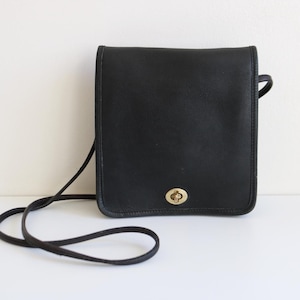 Coach NYC Compact Pouch Bag | Black Leather