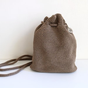 The Sak Hand-Crochet Brown Large Drawstring Backpack The Sak Boho Chic Crochet Drawstring Backpack Tan Khaki  main image 2
