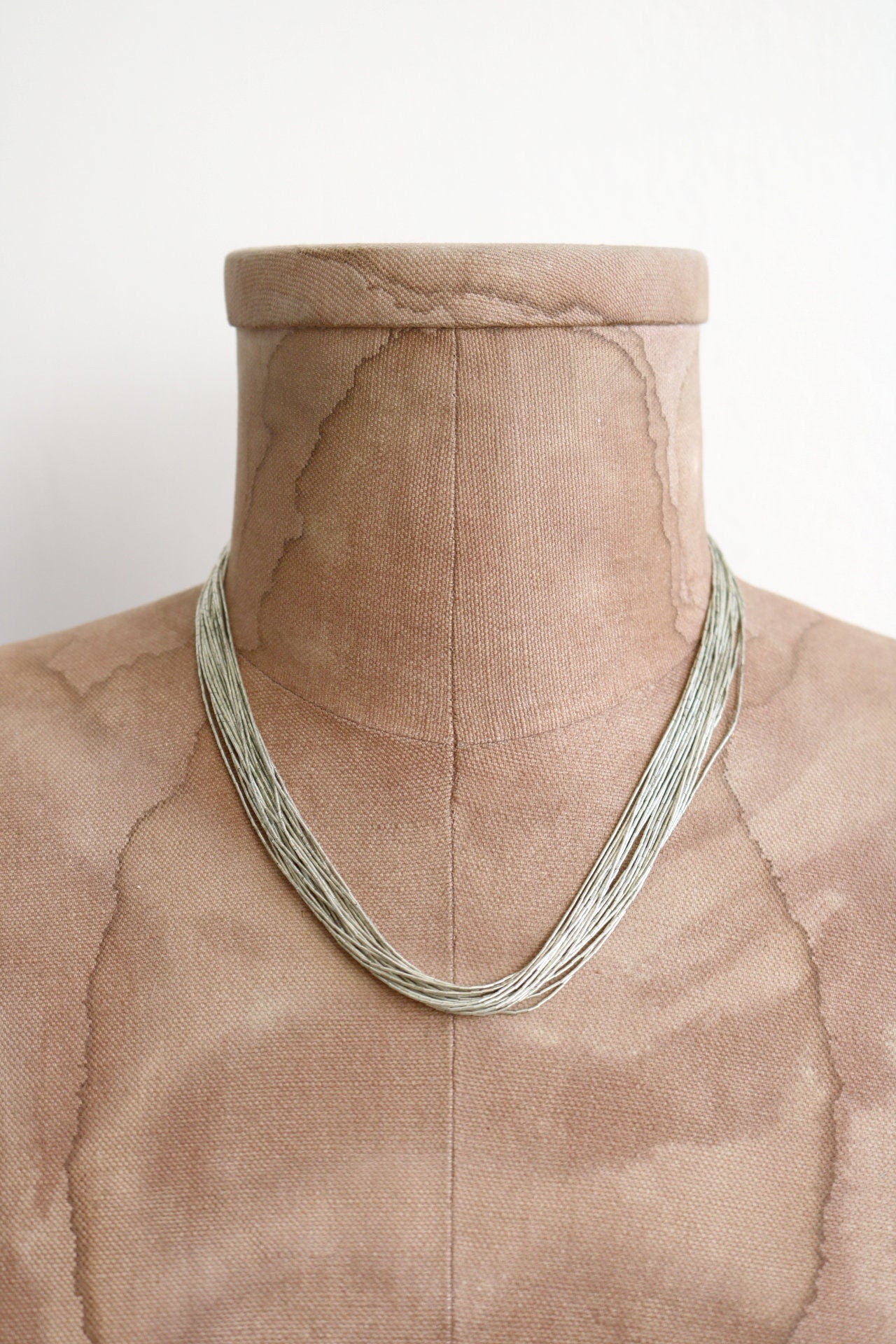 Liquid silver hotsell necklace 20 strands