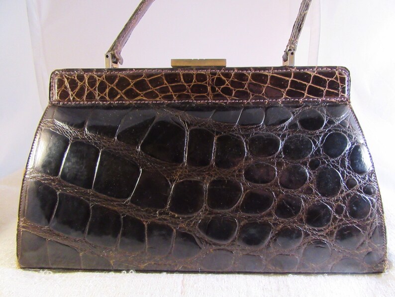 white alligator purse