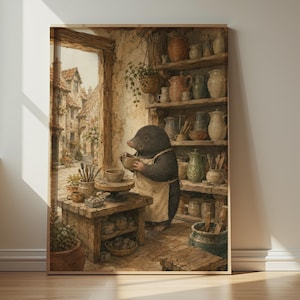 May include: A framed wall art print depicting a dark-furred mole wearing a beige apron, standing in a rustic pottery workshop. The mole is shaping a clay bowl on a wooden wheel. Shelves filled with ceramic jugs and pots line the stone walls.