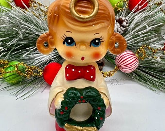 Blume large caroling girl figurine with pigtails and large Christmas wreath