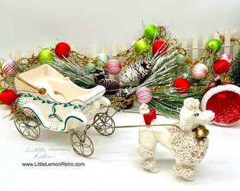 Very HFT Napco Christmas poodle pulling holly-adorned carriage; 3 piece set