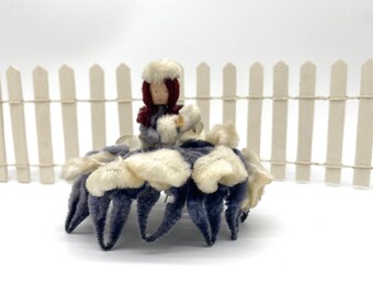 Vintage chenille piper cleaner doll in blue and white dress