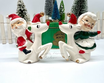 MCM Napco Santa and Mrs. Claus Riding Reindeer salt pepper shaker set
