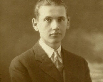 Vintage Photo of a Man in a Pin Striped Suit circa 1920s in Sepia