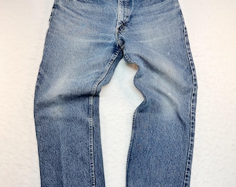 Vintage Orange Tab Levi’s 619 Jeans