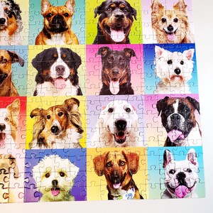 May include: A colorful jigsaw puzzle featuring a grid of various dog breeds. Each puzzle piece showcases a different dog, with a variety of colors and expressions. The background of each piece is a different solid color.