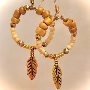 Golden Feather Hoop Earrings: Dangle & Drop Jewelry