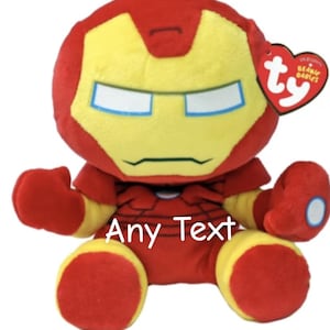 May include: A white ceramic mug with a black handle and the text "But First, Coffee" in a black, bold font. The mug is likely 11 ounces in size and sits on a white surface.