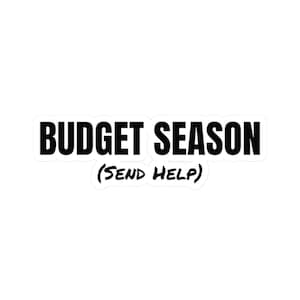 May include: A white sticker with the words "BUDGET SEASON" in bold, black capital letters. Below, in parentheses, the text reads "(SEND HELP)". The sticker has a black border.