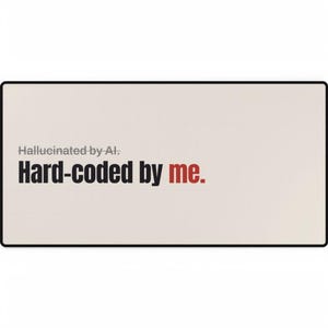May include: A rectangular desk mat with a light beige surface and a thin black border. The text "Hallucinated by AI." appears in small gray letters above the larger, bold black text "Hard-coded by" followed by the red word "me."