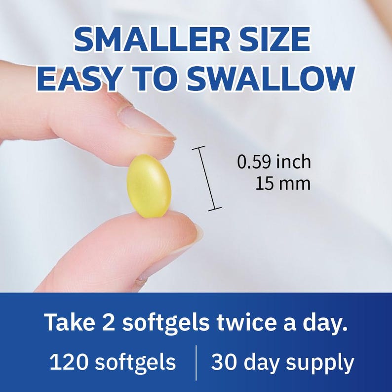 Puede incluir: Una c&aacute;psula blanda amarilla, de aproximadamente 15 mm de largo, se sostiene entre dos dedos. El texto superior dice "SMALLER SIZE EASY TO SWALLOW". Debajo, se lee "Take 2 softgels twice a day. 120 softgels | 30 day supply."