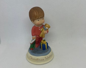 Christmas Wishes Little Boy Holding Stocking and Teddy Bear Reading, Present at Feet Figurine Avon Porcelain 1987