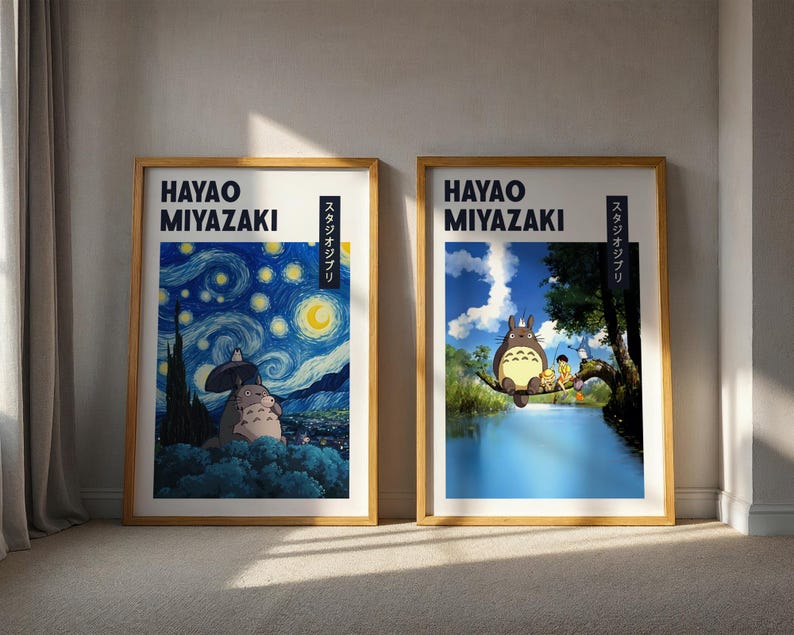 May include: Two framed art prints featuring Hayao Miyazaki artwork. One print depicts a scene inspired by Van Gogh's Starry Night with Totoro characters. The other shows Totoro and friends by a river. Both have text.
