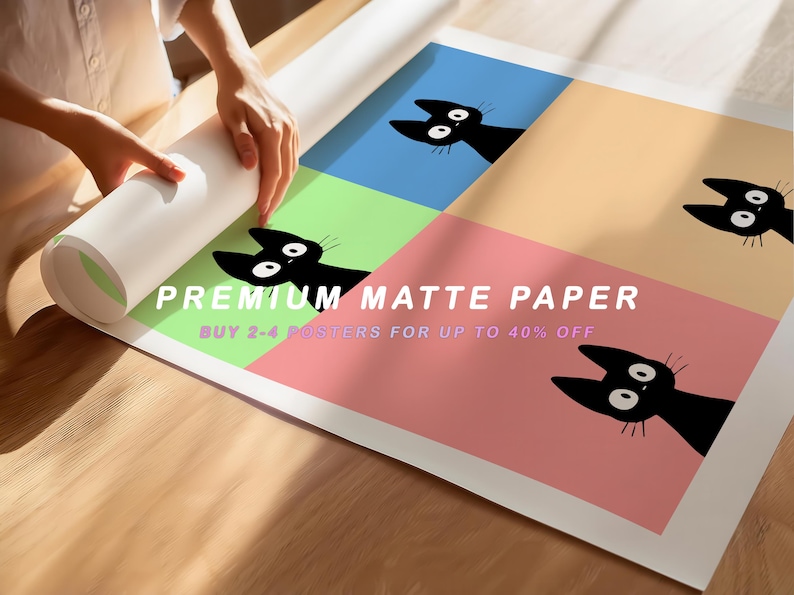 May include: A rolled-up poster featuring a repeating pattern of black cat faces on a colorful background. The poster has text that reads "PREMIUM MATTE PAPER" and "BUY 2-4 POSTERS FOR UP TO 40% OFF". The background colors are blue, green, peach, and pink.