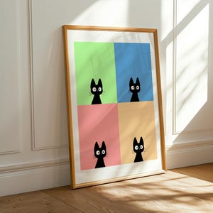 May include: A framed art print featuring four panels, each with a different pastel background color: green, blue, pink, and orange. Each panel displays a black cat silhouette with large eyes. The frame is made of wood.