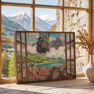 May include: A framed artwork showing a fantastical floating castle above a village, with mountains and a lake in the background. The artwork is displayed near a window with a mountain view, and two vases with dried plants.